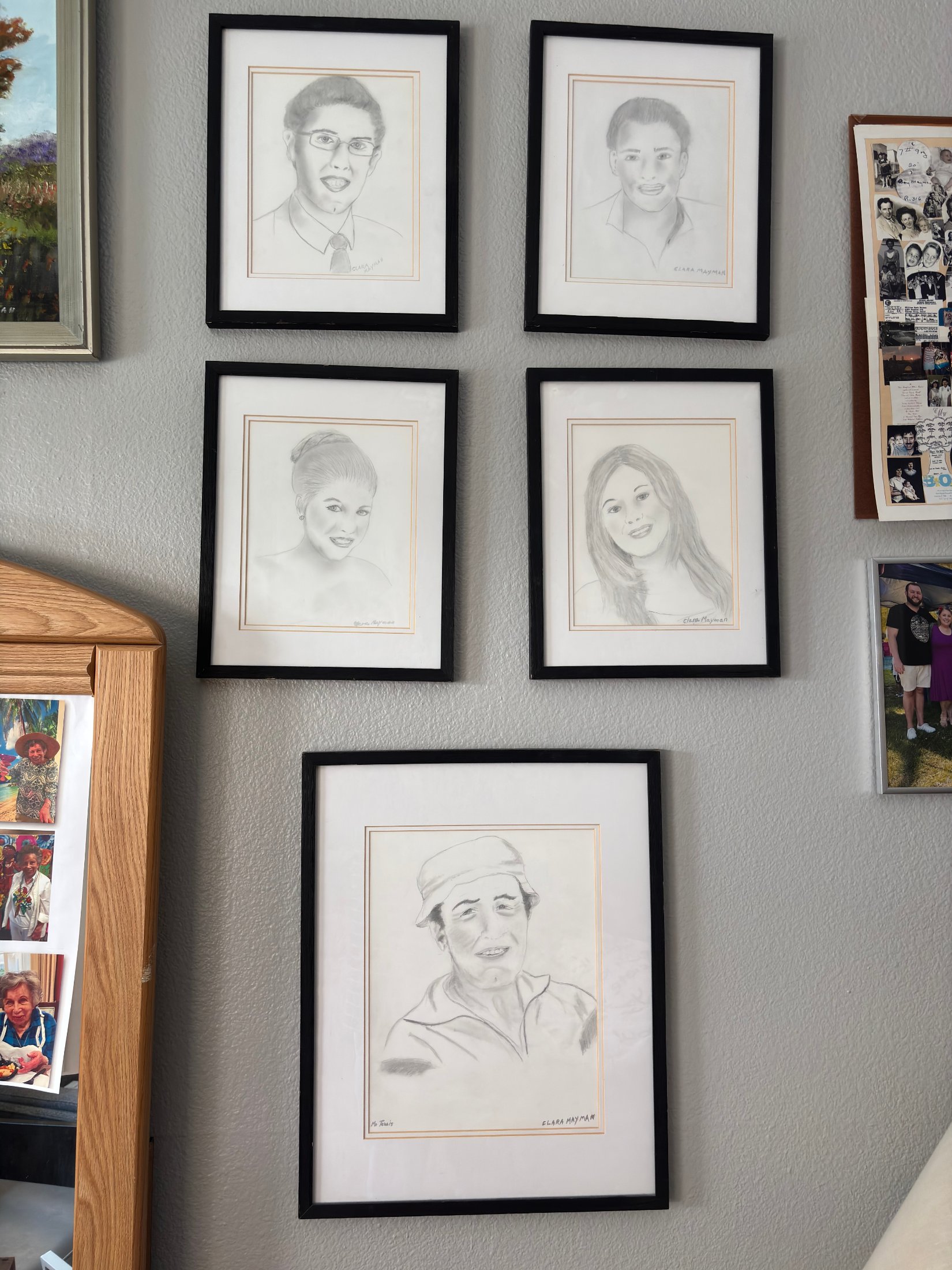 Clara's original charcoals of Sid and 4 grandchildren